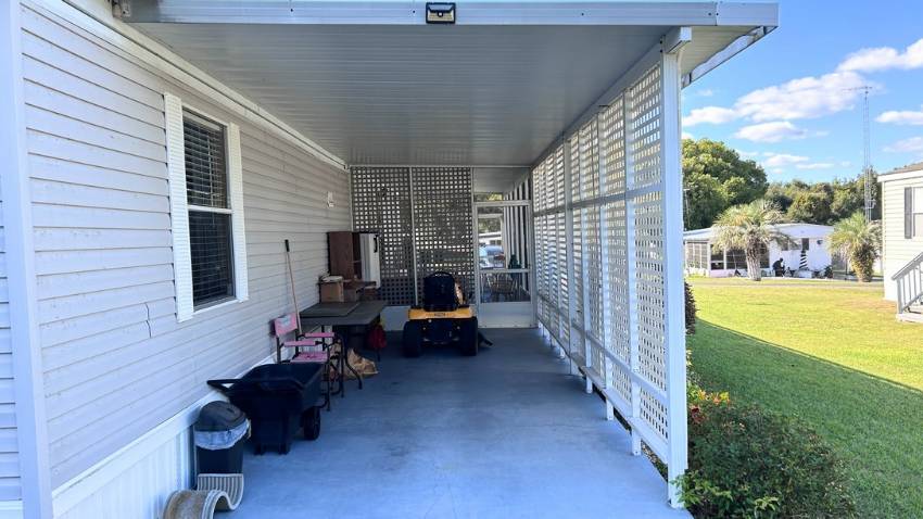 Weirsdale, FL Mobile Home for Sale located at 12701 Se Sunset Harbor Rd. Big Lake Village